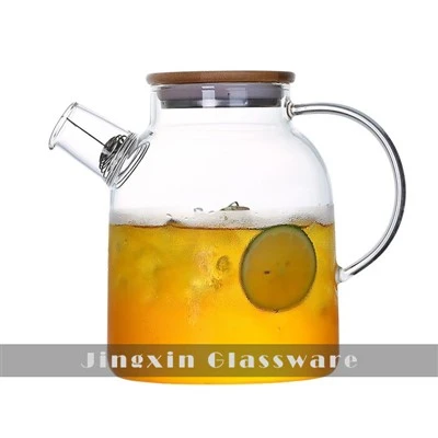 Glas tekande med metal infuser